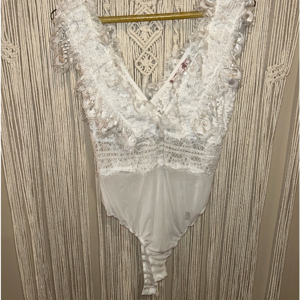 Lace white onesie with ruffles
